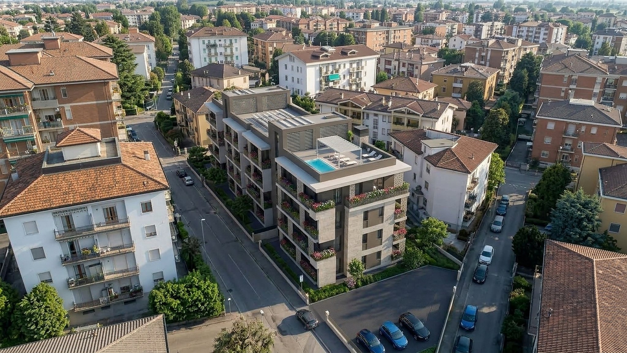 Vista aerea della residenza nel quartiere Navigatori, con la luce calda del pomeriggio